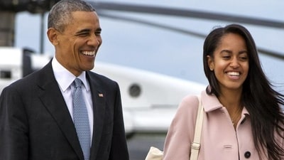 President Barack Obama jokes with his daughter Malia Obama as they walk to board Air Force One. Like her parents, Malia will be joining Harvard University in 2017, after taking a year off before that. (AP file photo) President Barack Obama jokes with his daughter Malia Obama as they walk to board Air Force One. Like her parents, Malia will be joining Harvard University in 2017, after taking a year off before that. (AP file photo)