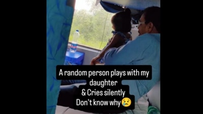 Snapshot of the elderly passenger playing with the girl. Snapshot of the elderly passenger playing with the girl.