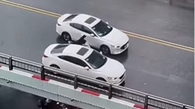 Typhoon Yagi devastates Vietnam, but a viral video shows cars forming a shield around a struggling biker, highlighting the nation's unity and resilience. (Instagram/@yourtubudd)