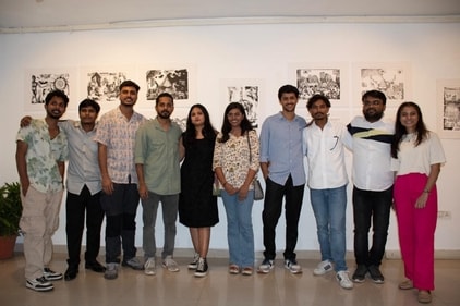 Artists  with their work at the Lithography Project Exhibition: A Record-Breaking Achievement, at Kala Srot Art Gallery