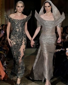 Hooded couture is now a thing, with designers experimenting in metallic, sheer, and satin. Hooded couture is now a thing, with designers experimenting in metallic, sheer, and satin.