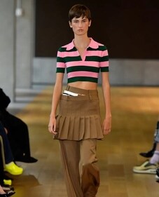 The collection had a back-to-school vibe, and pleated skirts paired with trousers were a fresh and unexpected trend. The collection had a back-to-school vibe, and pleated skirts paired with trousers were a fresh and unexpected trend.