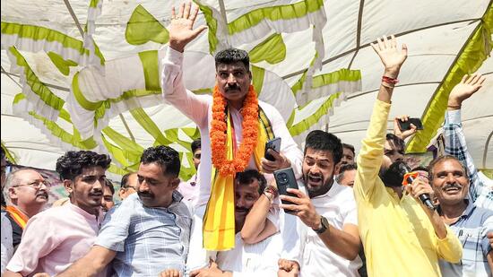 J&K BJP vice-president Pawan Khajuria and his supporters protesting against ticket distribution in Udhampur. (ANI)