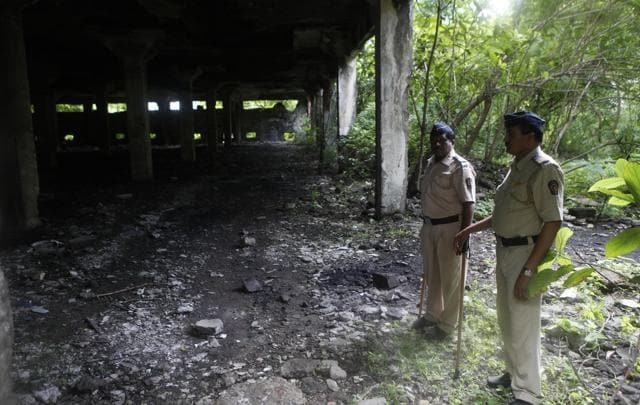 Policeman at the spot inside Shakti Mills in Mahalaxmi where the woman was raped. (Anshuman Poyrekar/HT Photo) Policeman at the spot inside Shakti Mills in Mahalaxmi where the woman was raped. (Anshuman Poyrekar/HT Photo)
