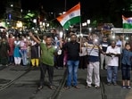 People took to the streets, forming human chain, holding mobile torch for 9 minutes at 9 pm demanding justice for the RG Kar rape-murder victim in Kolkata on Monday, (Samir Jana/ Hindustan Times)