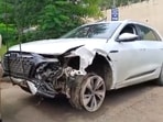 A police personnel near the damaged Audi owned by Maharashtra BJP chief Chandrashekhar Bawankule's son Sanket Bawankule. A police personnel near the damaged Audi owned by Maharashtra BJP chief Chandrashekhar Bawankule's son Sanket Bawankule.
