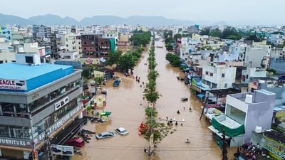 Vijaywada, Sep 02 (ANI): An aerial view of the waterlogged Vijaywada city following heavy rainfall, on Monday. (ANI Photo) (ANI) Vijaywada, Sep 02 (ANI): An aerial view of the waterlogged Vijaywada city following heavy rainfall, on Monday. (ANI Photo) (ANI)