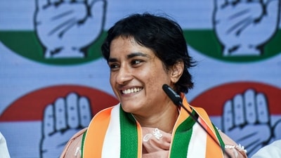 Wrestler Vinesh Phogat joins the Congress, at AICC headquarters in New Delhi on Friday. (ANI Photo/Jitender Gupta) (Jitender Gupta) Wrestler Vinesh Phogat joins the Congress, at AICC headquarters in New Delhi on Friday. (ANI Photo/Jitender Gupta) (Jitender Gupta)