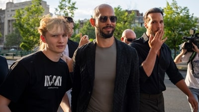 Two British women have come forward with horrific stories of being strangled and raped by Tate, while one more woman has accused his younger brother Tristan of rape, claiming that he put his hands around her throat as he did so. (AP) Two British women have come forward with horrific stories of being strangled and raped by Tate, while one more woman has accused his younger brother Tristan of rape, claiming that he put his hands around her throat as he did so. (AP)