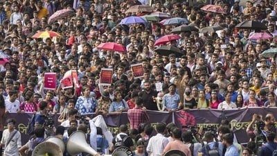 Junior doctors march towards Swasthya Bhawan during a protest over the RG Kar Hospital rape and murder incident in Kolkata on Tuesday. (PTI) Junior doctors march towards Swasthya Bhawan during a protest over the RG Kar Hospital rape and murder incident in Kolkata on Tuesday. (PTI)