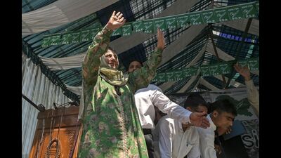 PDP president Mehbooba Mufti greets her supporters during an election campaign rally in Pulwama. (AFP) PDP president Mehbooba Mufti greets her supporters during an election campaign rally in Pulwama. (AFP)