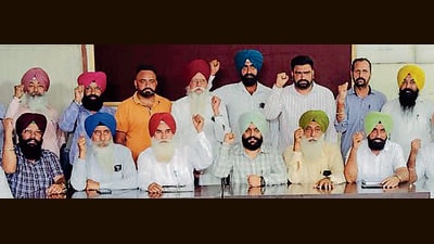 PSPCL employees staging a protest in Ludhiana on Tuesday. (HT Photo) PSPCL employees staging a protest in Ludhiana on Tuesday. (HT Photo)