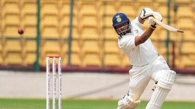 India B player Sarfaraz Khan plays a shot during the third day of Duleep Trophy 2024 match against India A (PTI) India B player Sarfaraz Khan plays a shot during the third day of Duleep Trophy 2024 match against India A (PTI)