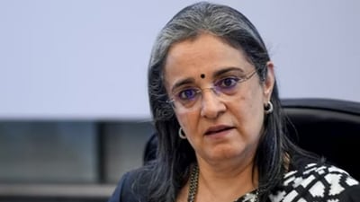 Sebi chief Madhabi Buch is seen. Mahindra Group clarified that approvals related to Sebi did not involve them and emphasized Dhaval Buch's role was based on his supply chain expertise. Sebi chief Madhabi Buch is seen. Mahindra Group clarified that approvals related to Sebi did not involve them and emphasized Dhaval Buch's role was based on his supply chain expertise.
