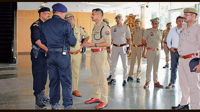 Security has been strengthened at various parts of the venue, including the helipad, halls inside the Expo Mart, nearby roads and parking arrangements that will be used during the conference, said officers. (HT Photo) Security has been strengthened at various parts of the venue, including the helipad, halls inside the Expo Mart, nearby roads and parking arrangements that will be used during the conference, said officers. (HT Photo)