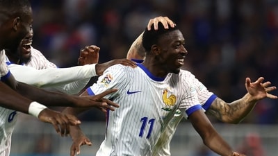 France's forward #11 Ousmane Dembele (C) celebrates after scoring France's second goal during the UEFA Nations League (AFP)