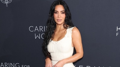 Kim Kardashian attended the 2024 Kering for Women dinner in New York, turning heads in a white bodycon dress that perfectly hugged her figure. With her nude makeup and wet tresses look, she radiated chic vibes. (Getty Images via AFP) Kim Kardashian attended the 2024 Kering for Women dinner in New York, turning heads in a white bodycon dress that perfectly hugged her figure. With her nude makeup and wet tresses look, she radiated chic vibes. (Getty Images via AFP)