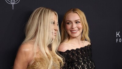 Fashion designer Donatella Versace and actor Lindsay Lohan attend the 2024 Kering for Women dinner at The Pool on September 09, 2024 in New York City. Lindsay wore sheer black lace outfit. (Getty Images via AFP)