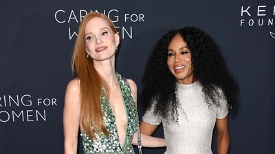 Actors Jessica Chastain (Left) and Kerry Washington attend the 2024 Kering Foundation's Caring for Women dinner at The Pool in New York City on September 9, 2024. While Jessica opted for a green gown, Kerry was dressed in white. (AFP)