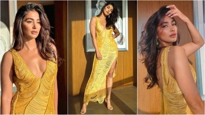 Pooja Hegde's latest look is pure glamour as she stuns in a vibrant yellow gown. Featuring a bold plunging neckline and a thigh-high slit, she effortlessly raises the style stakes. (Instagram) Pooja Hegde's latest look is pure glamour as she stuns in a vibrant yellow gown. Featuring a bold plunging neckline and a thigh-high slit, she effortlessly raises the style stakes. (Instagram)