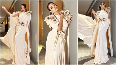 Malaika Arora is a vision in white in her latest look, featuring a stunning gown adorned with delicate floral embellishments. (Instagram) Malaika Arora is a vision in white in her latest look, featuring a stunning gown adorned with delicate floral embellishments. (Instagram)