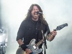 US musician Dave Grohl of rock band Foo Fighters performs on the Orange Stage at Roskilde Festival on July 5, 2024 in Roskilde, Denmark. (Photo by Helle Arensbak / Ritzau Scanpix / AFP) / Denmark OUT