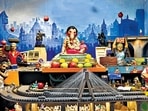 Mumbai, India - Sept. 9, 2024:Artist Parag Sawant created diorama (miniature model) of a Mumbai, various iconic places, names of road dedicated to renowned person and Labours of all category who have contributed in development of iconic city, installed Ganpati idol in it, as a part of Ganesh Chaturthi celebrations in his house at Lalbaug, in Mumbai, India, on Monday, September 9, 2024. (Photo by Anshuman Poyrekar/ Hindustan Times) (Hindustan Times)