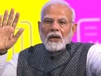 Prime Minister Narendra Modi addresses a gathering during the inauguration of SEMICON India 2024, in Greater Noida, Uttar Pradesh. He highlighted India's commitment to enhancing infrastructure and promoting inclusive growth in the semiconductor sector.