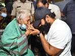 Sai Durgha Tej interacting with old people at the home he visited in Vijayawada.
