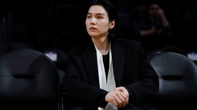 Suga has been doing his mandatory military service since September 2023. (AP) Suga has been doing his mandatory military service since September 2023. (AP)