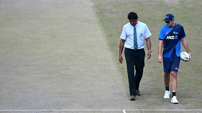 Match Referee Javagal Srinath (L) along with New Zealand's captain Tim Southee inspect the pitch (AFP)