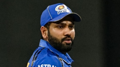 Rohit Sharma looks on during the Indian Premier League (IPL) Twenty20 cricket match between Mumbai Indians and Lucknow Super Giants at the Wankhede Stadium (AFP)