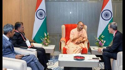 Chief minister Yogi Adityanath interacts with dignitaries during the inauguration of SEMICON India 2024, at the India Expo Mart, in Greater Noida on Wednesday. (ANI Photo)
