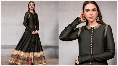 Aditi Rao Hydari is the epitome of grace and elegance in a stunning black embroidered anarkali. The enchanting golden detailing along the neckline and broad borders adds a touch of royal charm, making her look truly regal. (Instagram/@aditiraohydari) Aditi Rao Hydari is the epitome of grace and elegance in a stunning black embroidered anarkali. The enchanting golden detailing along the neckline and broad borders adds a touch of royal charm, making her look truly regal. (Instagram/@aditiraohydari)