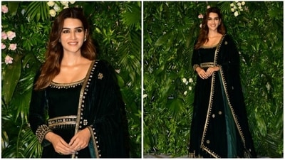 Kriti Sanon stole the limelight in an elegant emerald green velvet anarkali suit. Embellished with intricate golden mirror work and paired with a matching duppata, she finished off her ethnic look with absolute perfection. (HT Photo/Naziyah Khan) Kriti Sanon stole the limelight in an elegant emerald green velvet anarkali suit. Embellished with intricate golden mirror work and paired with a matching duppata, she finished off her ethnic look with absolute perfection. (HT Photo/Naziyah Khan)