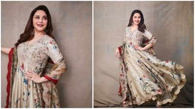 Madhuri Dixit rocked a stunning beige floral anarkali suit, featuring vibrant floral prints on the subtle beige backdrop. Paired with a matching duppata and statement earrings, she wowed her fans with her effortless elegance. (Instagram/@madhuridixtnene) Madhuri Dixit rocked a stunning beige floral anarkali suit, featuring vibrant floral prints on the subtle beige backdrop. Paired with a matching duppata and statement earrings, she wowed her fans with her effortless elegance. (Instagram/@madhuridixtnene)