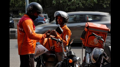 FILE PHOTO: Gig workers prepare to deliver orders outside Swiggy's grocery warehouse at a market area in New Delhi, India, May 6, 2024. REUTERS/Priyanshu Singh/File Photo (REUTERS) FILE PHOTO: Gig workers prepare to deliver orders outside Swiggy's grocery warehouse at a market area in New Delhi, India, May 6, 2024. REUTERS/Priyanshu Singh/File Photo (REUTERS)