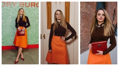 Joey King channeled retro fashion in her outfit. She wore a brown high-neck, full-sleeved top, with a bright orange skirt. Her top had an ornate and jeweled neckline. The actor followed the fashion rules to a tee. She employed the efficient technique of colour blocking which made her outfit stand out. Keeping the styling rules in mind, she matched her bag's color to her red pumps. Joey King channeled retro fashion in her outfit. She wore a brown high-neck, full-sleeved top, with a bright orange skirt. Her top had an ornate and jeweled neckline. The actor followed the fashion rules to a tee. She employed the efficient technique of colour blocking which made her outfit stand out. Keeping the styling rules in mind, she matched her bag's color to her red pumps. 