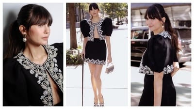 Nina Dobrev wore a beautiful two-piece set. Her cropped jacket had puffed sleeves. The jacket was left unbuttoned for a fiery twist. Dainty floral embroidery adorned her jacket and skirt hemline. Even her pumps had a similar black-and-white design. Nina Dobrev wore a beautiful two-piece set. Her cropped jacket had puffed sleeves. The jacket was left unbuttoned for a fiery twist. Dainty floral embroidery adorned her jacket and skirt hemline. Even her pumps had a similar black-and-white design.