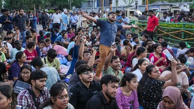 Kolkata: Junior doctors shout slogans as they sit on a dharna after the police stopped their protest march towards Swasthya Bhawan over the RG Kar Hospital rape and murder. (PTI) Kolkata: Junior doctors shout slogans as they sit on a dharna after the police stopped their protest march towards Swasthya Bhawan over the RG Kar Hospital rape and murder. (PTI)
