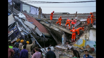 SDRF personnel conduct rescue operation after a three-storey building collapsed, crushing a truck under its debris, at Transport Nagar area in Lucknow on September 7, 2024. At least 10 people were injured in the incident, according to officials. (PTI) SDRF personnel conduct rescue operation after a three-storey building collapsed, crushing a truck under its debris, at Transport Nagar area in Lucknow on September 7, 2024. At least 10 people were injured in the incident, according to officials. (PTI)