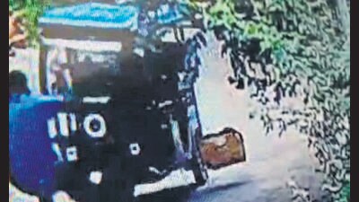 Screen grab of a CCTV footage showing the e-rickshaw hitting STA inspector Ravinder in Transport Area, Sector 26, Chandigarh. (HT Photo)