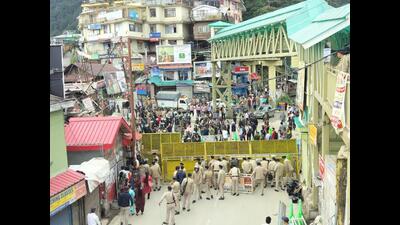 Security forces barricade the road leading to the disputed mosque in Sanjauli after Hindu organisations called for a protest in Shimla on Wednesday. (Deepak Sansta/HT) Security forces barricade the road leading to the disputed mosque in Sanjauli after Hindu organisations called for a protest in Shimla on Wednesday. (Deepak Sansta/HT)