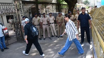 Several Mumbai Police officials were present on the spot as Malaika Arora and her sister Amrita Arora as well as other celebs reached her father's home in Bandra. Kareena Kapoor, who is a very close friend of Malaika and Amrita, was one of the celebs spotted. (All pics: Varinder Chawla) Several Mumbai Police officials were present on the spot as Malaika Arora and her sister Amrita Arora as well as other celebs reached her father's home in Bandra. Kareena Kapoor, who is a very close friend of Malaika and Amrita, was one of the celebs spotted. (All pics: Varinder Chawla)