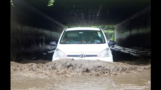 Waterlogging occurred under the underpass in front of Lucknow Ekana Stadium in Lucknow on Wednesday (Deepak Gupta/HT)