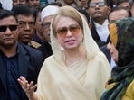 Bangladesh's former prime minister and Bangladesh Nationalist Party (BNP) chairperson Khaleda Zia, center, leaves after a court appearance in Dhaka, Bangladesh.