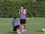 Lionel Messi (10) reacts during practice.