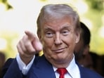Former FBI Deputy Director Andrew McCabe expresses concerns over Donald Trump's ties to Russia, calling for scrutiny. (AP Photo/Yuki Iwamura)
