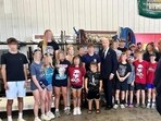 Joe Biden poses with kids wearing pro-Trump shirts in Pennsylvania (@bennyjohnson/X) Joe Biden poses with kids wearing pro-Trump shirts in Pennsylvania (@bennyjohnson/X)
