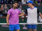 Carlos Alcaraz, of Spain, left, talks with Jannik Sinner, of Italy, after a match. Carlos Alcaraz, of Spain, left, talks with Jannik Sinner, of Italy, after a match.